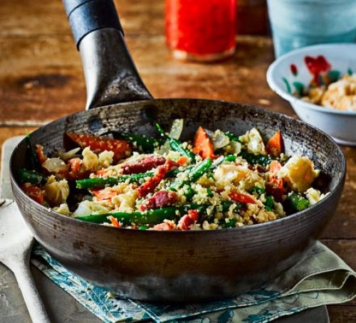 Egg-fried cauliflower rice with prawn cracker crumbs