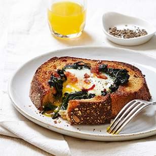 Egg-in-a-hole with spinach & bacon