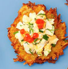 Egg salad topped latkes