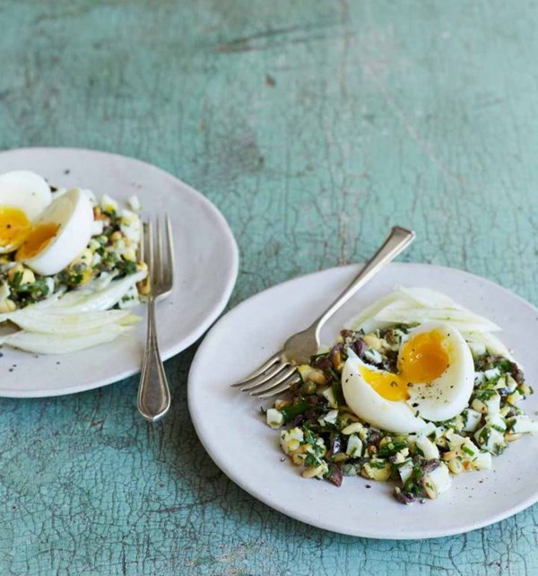 Egg salad with anchovies, capers, olives and pine nuts