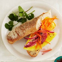 Egg sandwich with sweet-sour carrots and onions