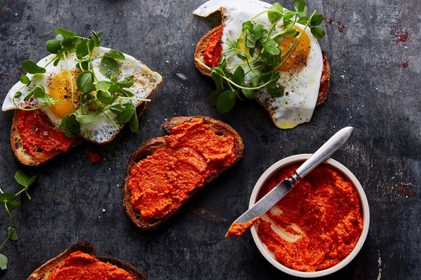 Egg tartines with romesco and greens