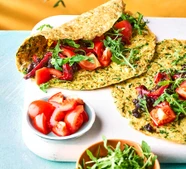 Egg wraps with black beans & rocket