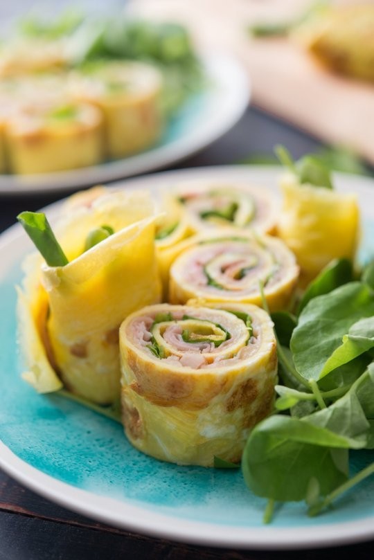 Egg wraps with ham and greens