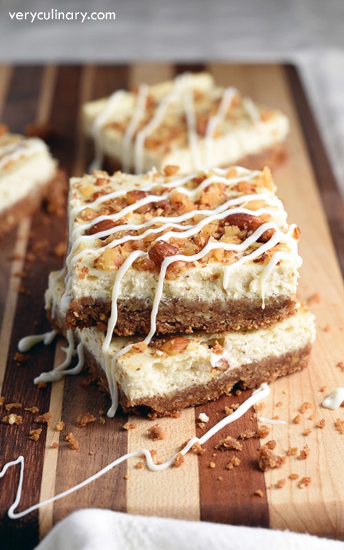 Eggnog cheesecake bars with white chocolate drizzle