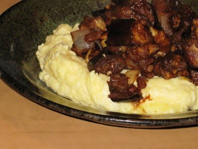 Eggplant caponata over creamy polenta
