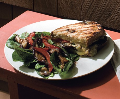 Eggplant, red pepper, and Fontina panini with spinach salad