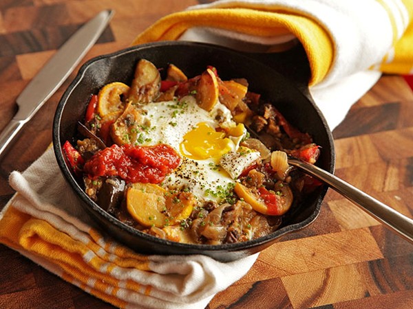 Eggplant, squash, and cherry tomato hash with baked eggs