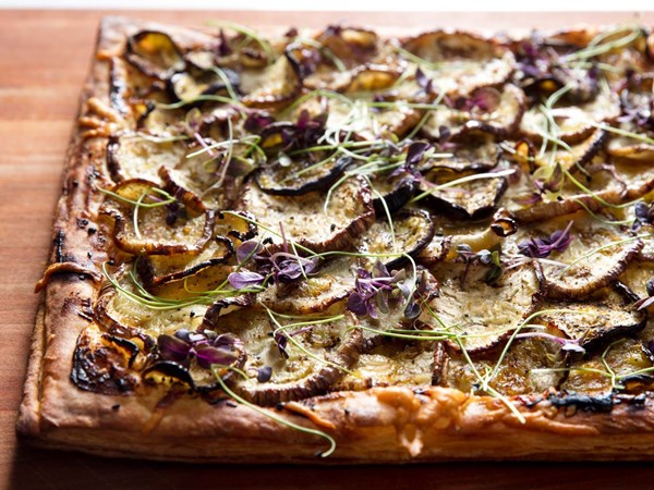 Eggplant tart with goat cheese, honey, and nigella