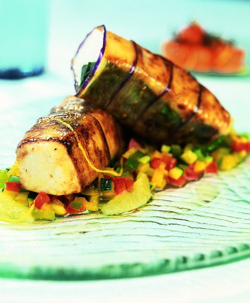 Eggplant-wrapped swordfish with tomato and Meyer lemon
