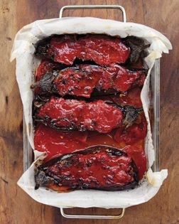 Eggplants imam bayeldi, stuffed with onions, peppers, cheese, and nuts