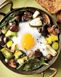 Eggs baked over sautéed mushrooms and spinach