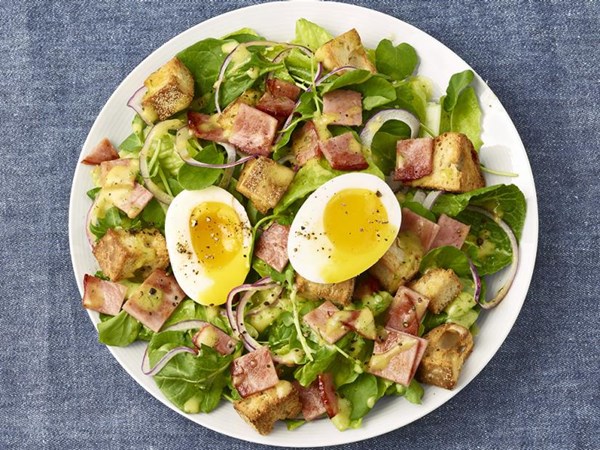 Eggs Benedict salad with dill Hollandaise dressing