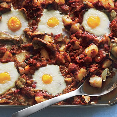 Eggs in purgatory with artichoke hearts, potatoes, and capers