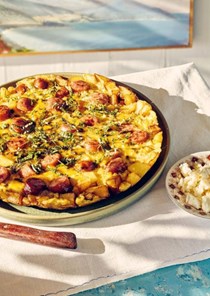 Eggs with sausages, potatoes and mint (Fourtalia)