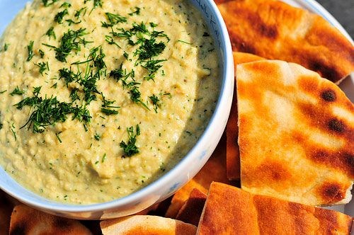 Ember-roasted onion and garlic dip with crispy pita