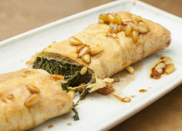 Empanada with spinach, torta del Casar and pine nut dressing