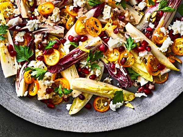 Endive salad with kumquats and pomegranate arils