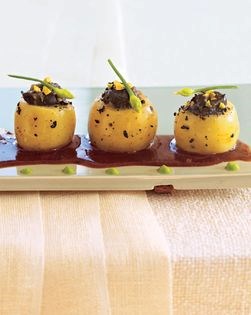 Escargots in potato cups with black truffles and toasted pistachios