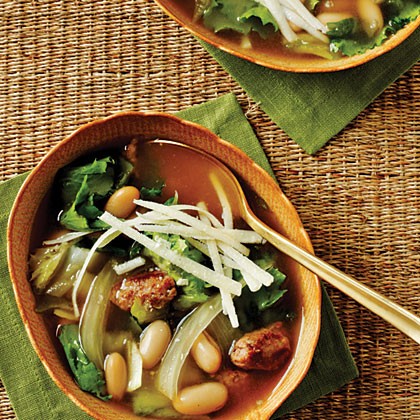 Escarole, bean, and sausage soup with Parmesan cheese