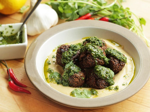 Falafel with black olives and harissa