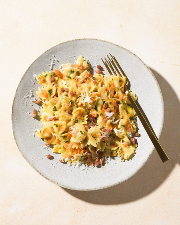 Farfalle with creamy carrots and pancetta