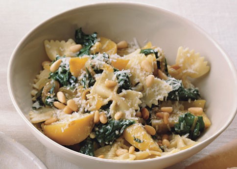 Farfalle with golden beets, beet greens, and pine nuts