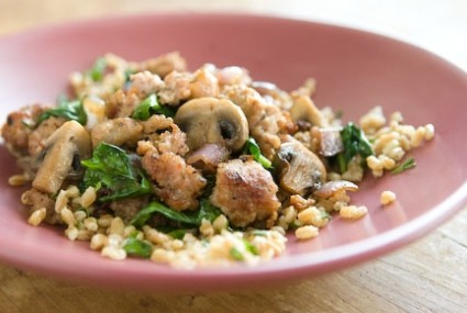 Farro and herb pilaf with sausage, mushrooms and spinach