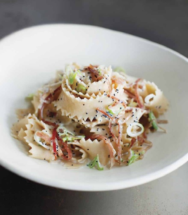 Farro pasta with speck, green onions, and poppy seeds