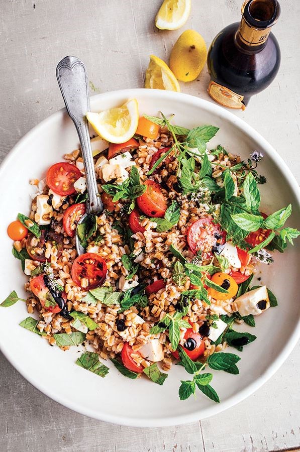 Farro salad with cherry tomatoes, smoked mozzarella, and mint