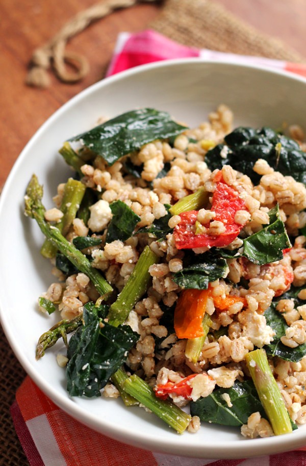 Farro salad with honey-roasted garlic tomatoes, asparagus, and kale 