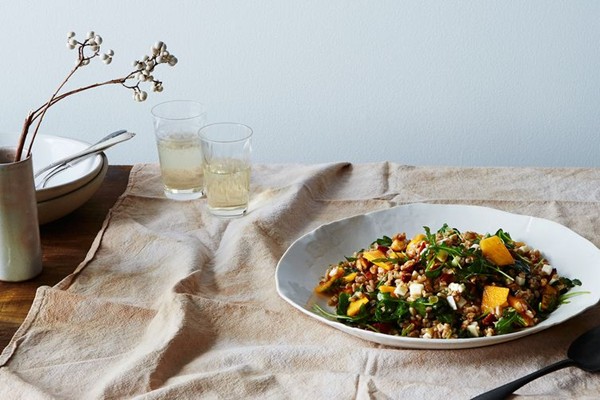 Farro salad with onion confit, persimmon and arugula