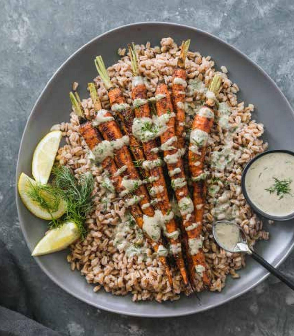 Farro with spice-roasted carrots and dill-garlic tahini sauce