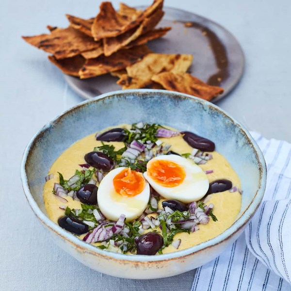 Fava bean puree, boiled egg, red onion, olives and parsley with crispbread
