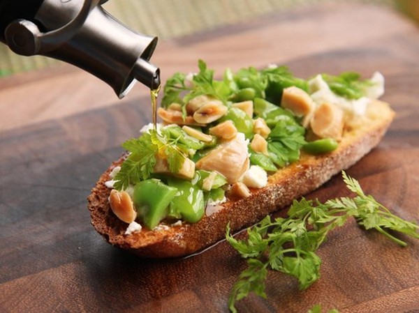 Fava bean tartine with goat cheese and marcona almonds