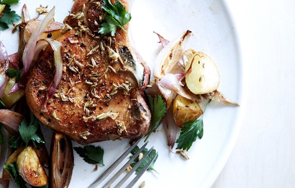 Fennel-crusted pork chops with potatoes and shallots