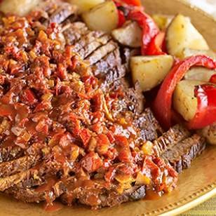 Fennel-garlic braised brisket with roasted peppers & potatoes