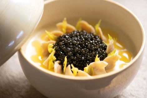 Fennel panna cotta with cockles, orange emulsion, and caviar
