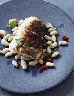 Fennel-smoked cod with warm bean salad