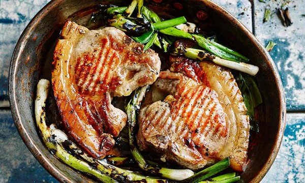 Fergus Henderson’s grilled pork chop and spring onions