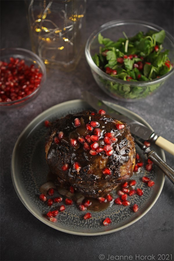 Festive roast lamb with pomegranate glaze