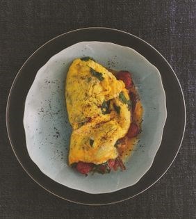 Feta and Manchego omelette with spinach, chorizo and sumac