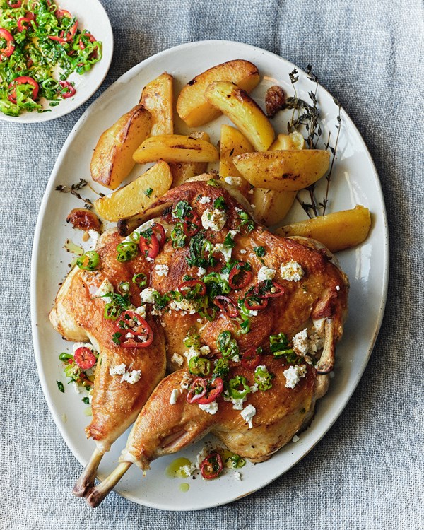 Feta-brined spatchcock chicken with mint and green onions