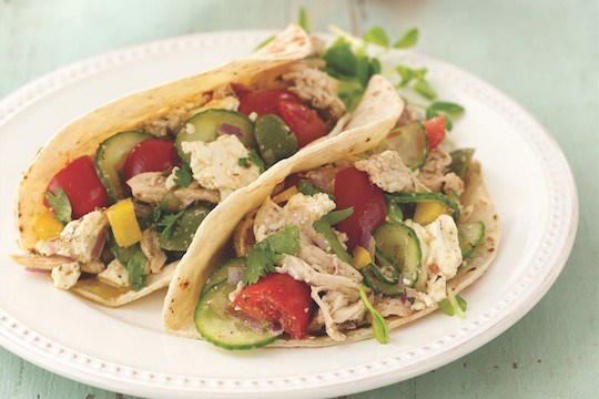 Feta, cumin, olive, and chicken tacos