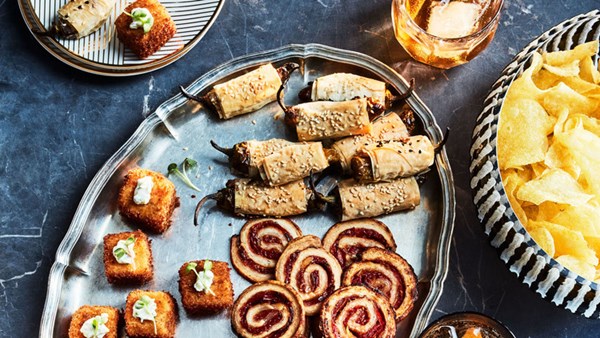 Feta-stuffed shishitos in phyllo