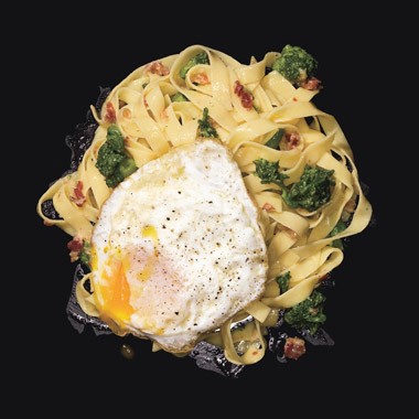 Fettuccine carbonara with fried eggs