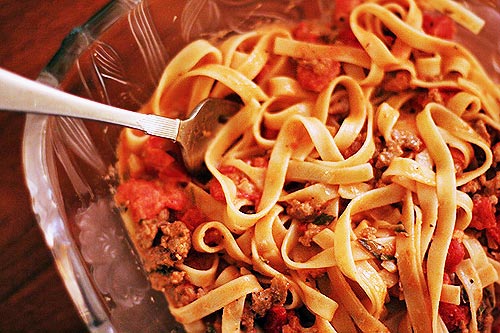 Fettuccine with creamy tomato Italian sausage sauce