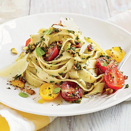 Fettuccine with pistachio-mint pesto and tomatoes