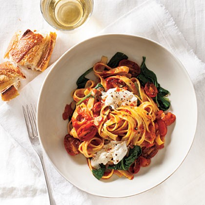 Fettuccine with seared tomatoes, spinach and burrata