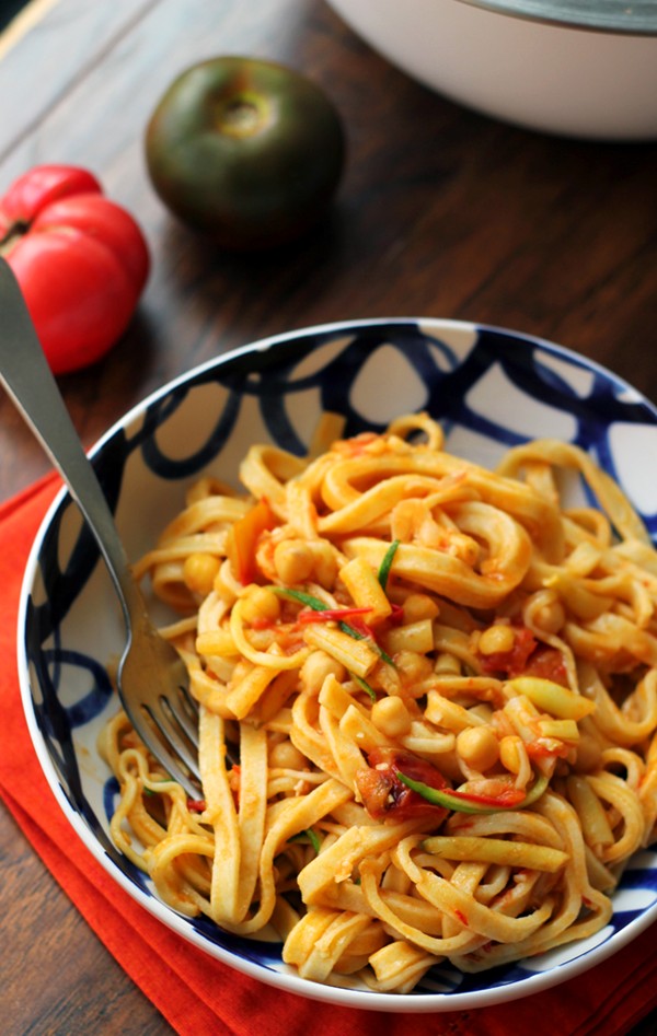 Fettuccine with zucchini, yellow wax beans, and harissa heirloom tomato sauce